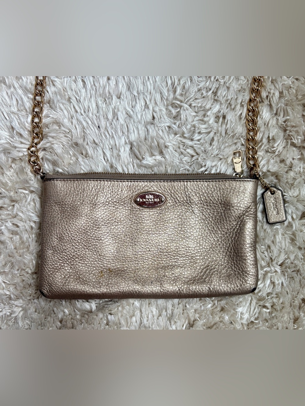 Coach Metallic Pebbled Leather Clutch in Rose Gold